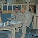 Sailors read newspapers at the Black Sheep Coffee House