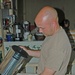 SFC Rick Weiss pours out old coffee