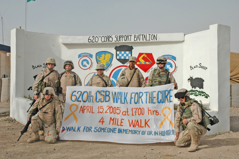 Soldiers display their banner before beginning