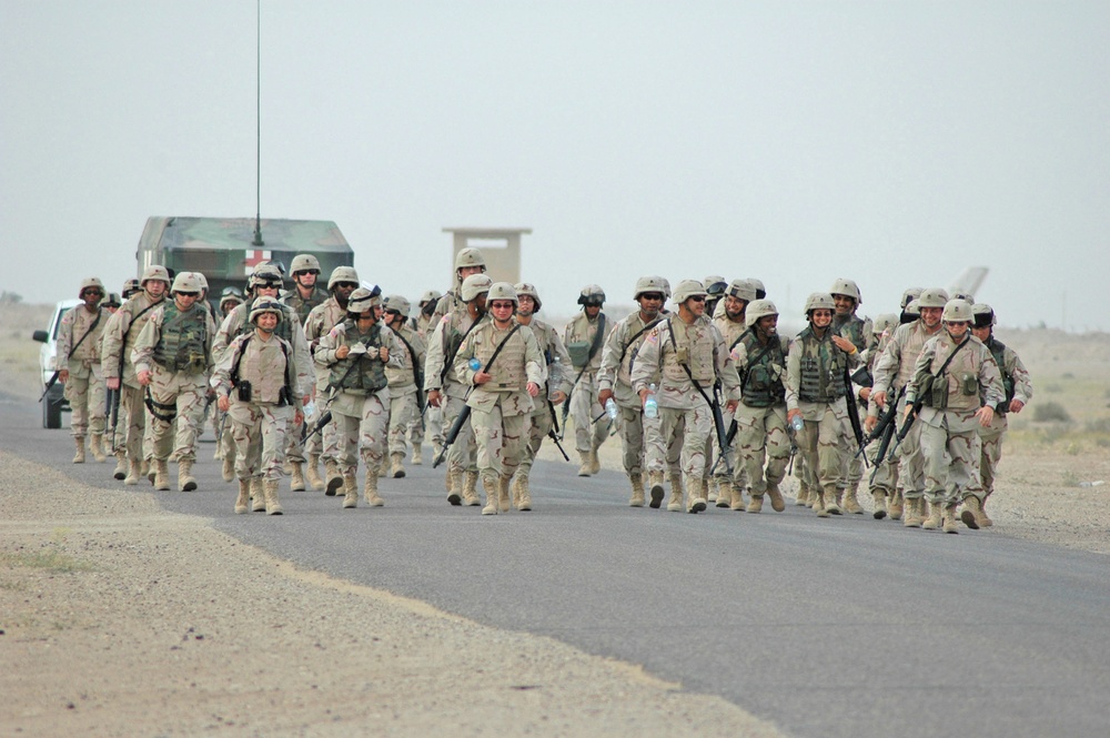 Soldiers finish walking the (620th CSB Walk for the Cure,) cance