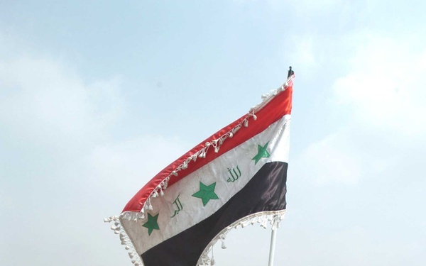 The Iraqi colors fly as 930 IPs celebrate