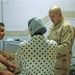 Spc. Eric Ingram checks an Iraqi Army Soldiers progress