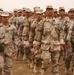 Iraqi Soldiers march in formation while practicing