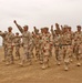 Iraqi Soldiers march in formation while practicing drill