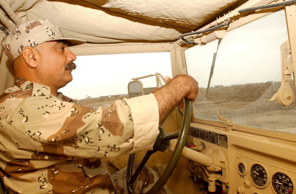 An Iraqi trainee drives a Russian Y-7A truck