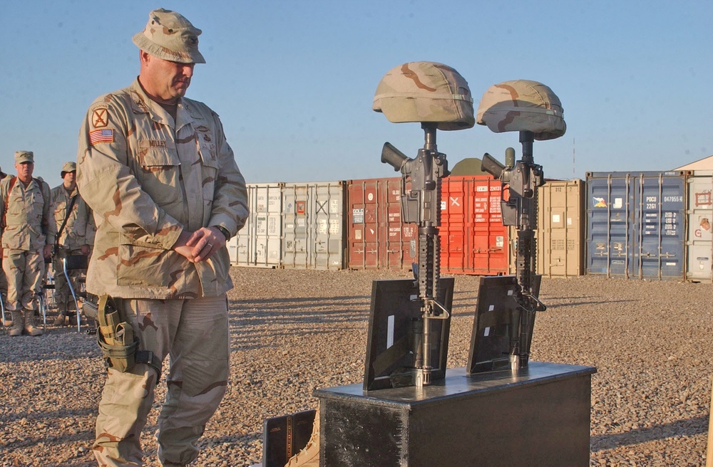 Col. Mark A. Milley pays his respect to fallen soldiers