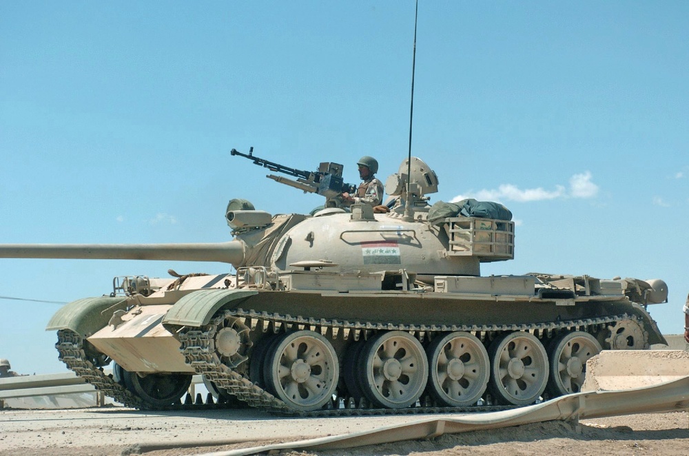 An Iraqi T-55 guards an overpass near the Western Baghdad distri