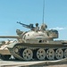 An Iraqi T-55 guards an overpass near the Western Baghdad distri