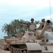 iraqi tank and american 113 provide security