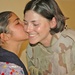1st Lt. Taylor receives a gift of thanks from an Iraqi girl