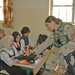 Capt. Whitney Jensen hands out Beanie Babies