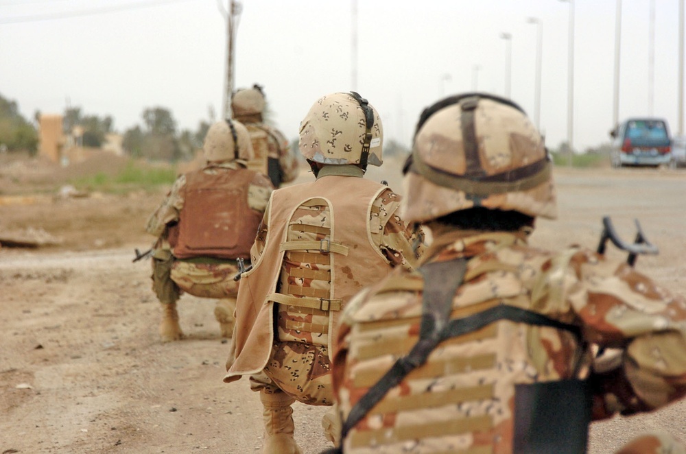 A combat patrol makes a security halt during action