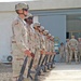 Soldiers stand as an honor guard during a memorial ceremony