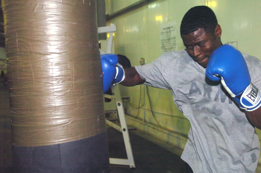Sgt. Eshun hits the heavy bag as part of his evening training