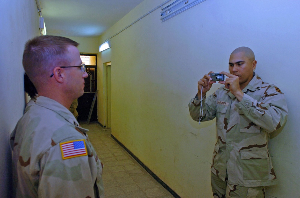 SSgt. Maisonet takes photos to be used in an ISOPREP packet