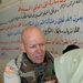 Dr. (Col.) John Lammie examines an Iraqi woman eyes