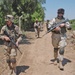 Sgt. Shannon Garstka and Pfc. Mitch Shelton patrol