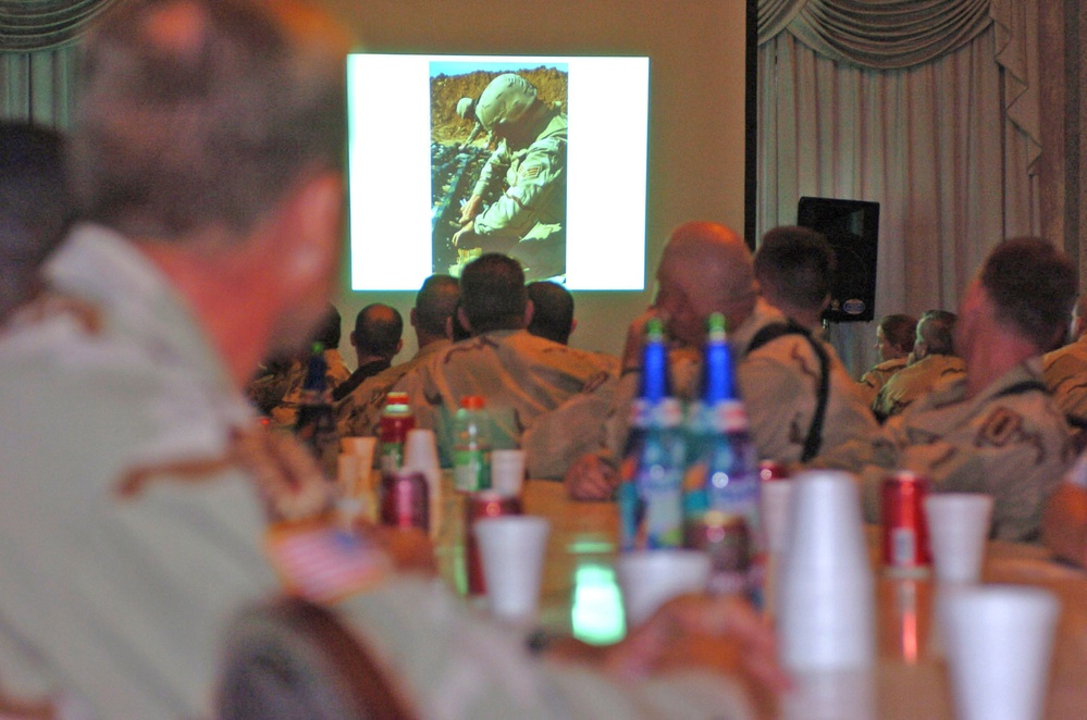 EOD servicemembers watch a slide show