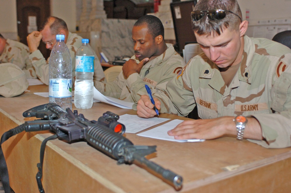 Spc. Jerome DeFrank takes a written exam