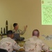 Cpl. Justin Mack gives a block of information about probing