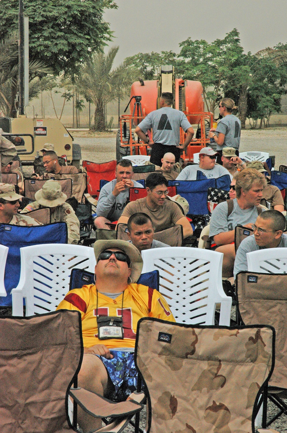 Soldiers and civilians wait for Toby Keith to take the stage