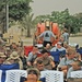 Soldiers and civilians wait for Toby Keith to take the stage