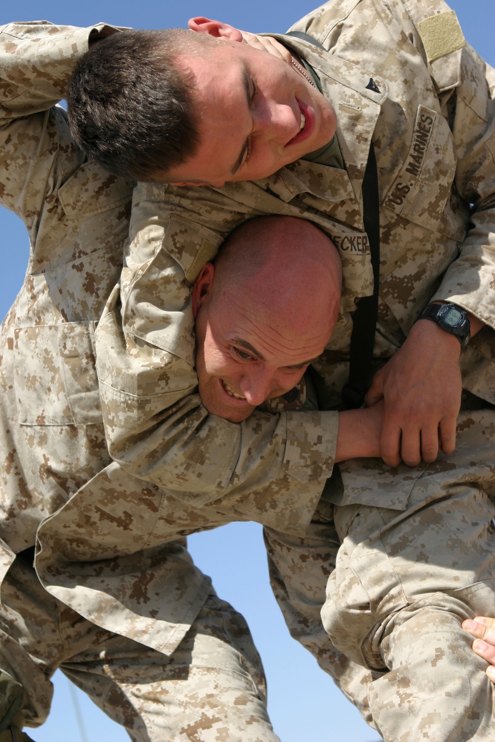 Cpl. Kyle Becker puts his older brother in a headlock