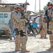 Sgt. Chris Ford and Sgt. 1st Class Tom Roach patrol