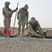 Marines smooth concrete poured into a crater