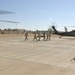 Soldiers transport a wounded Marine to the Blackhawk