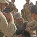 Spc. Scott Turk conducts a pre-mission inspection