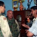 SFC Todd Kuchelmeister talks with local Iraqi leaders