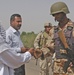 An Iraqi army soldier inspecting the indetification