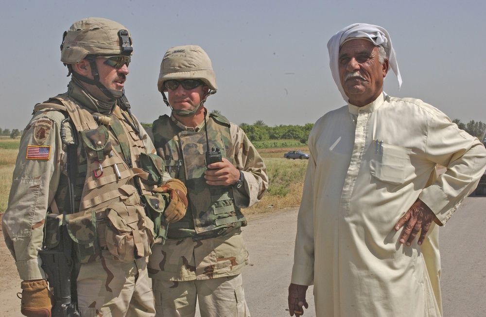 Capt. Paul Shannon talks to a city council member