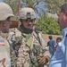 Capt. Paul Shannon talks to an Iraqi police officer