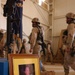 Soldiers file past the memorial of Pfc. Wesley R. Riggs