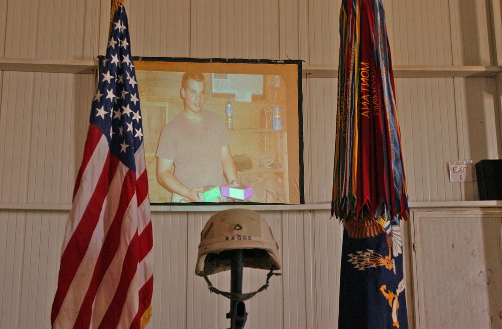 A slide show of Pfc. Wesley R. Riggs was played