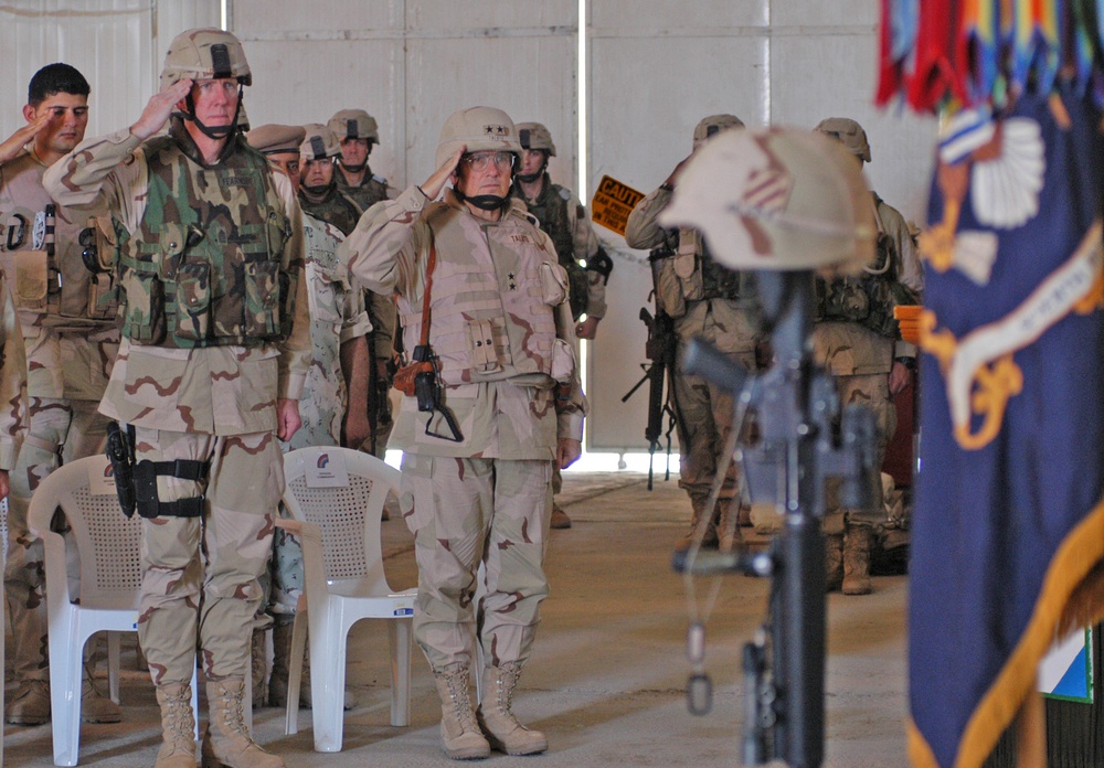 Maj. Gen. Taluto and Command Sgt. Maj. Fearnside salute