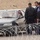 An Iraqi policeman checke the identification An Iraqi policeman checke the identification