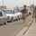 Soldiers visually inspect vehicles waiting to enter Soldiers visually inspect vehicles waiting to enter
