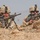 Soldiers provide overwatch to an IP traffic control point Soldiers provide overwatch to an IP traffic control point