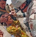 SSgt. Imperato dresses the wound of an Iraqi child