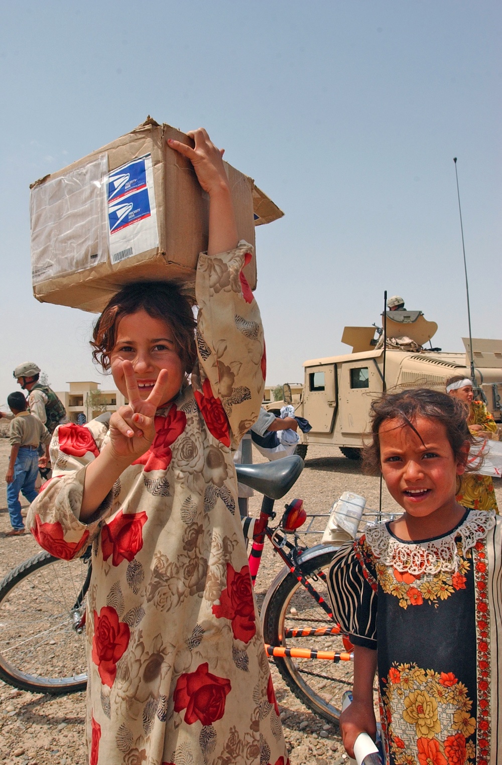 Iraqi children show their appreciation for the food/toys