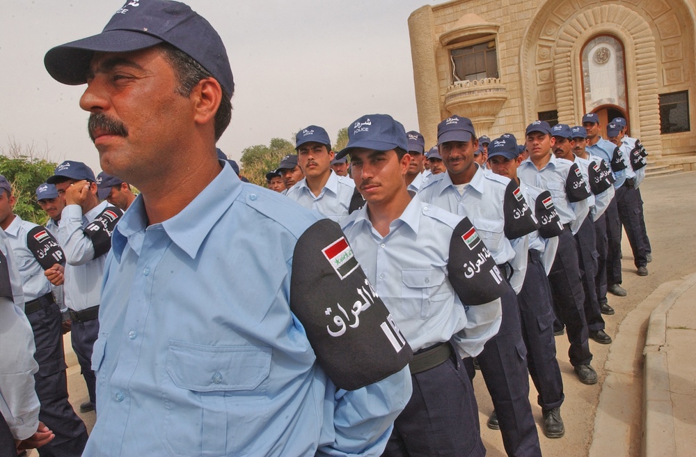 Two-hundred Iraqi Police recruits prepare to march