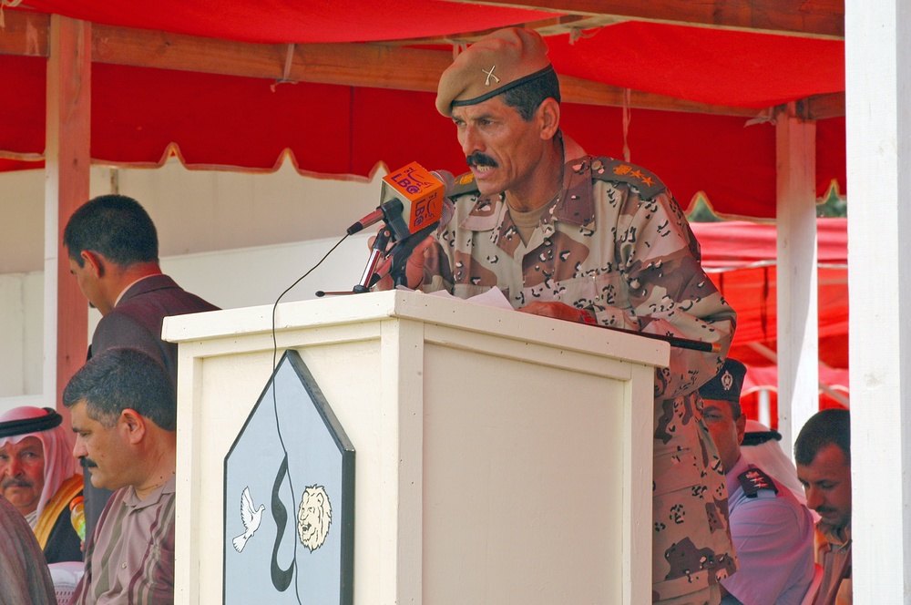 Iraqi Army Col. Faris Shaker speaks to the graduating class