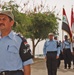 The Iraqi CO stands before the graduating class