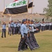 The Iraqi Color Guard leads 200 newly trained Policemen