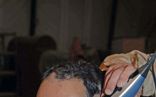 Lt. Col. Xavier Villarreal loses a bet to his squadron