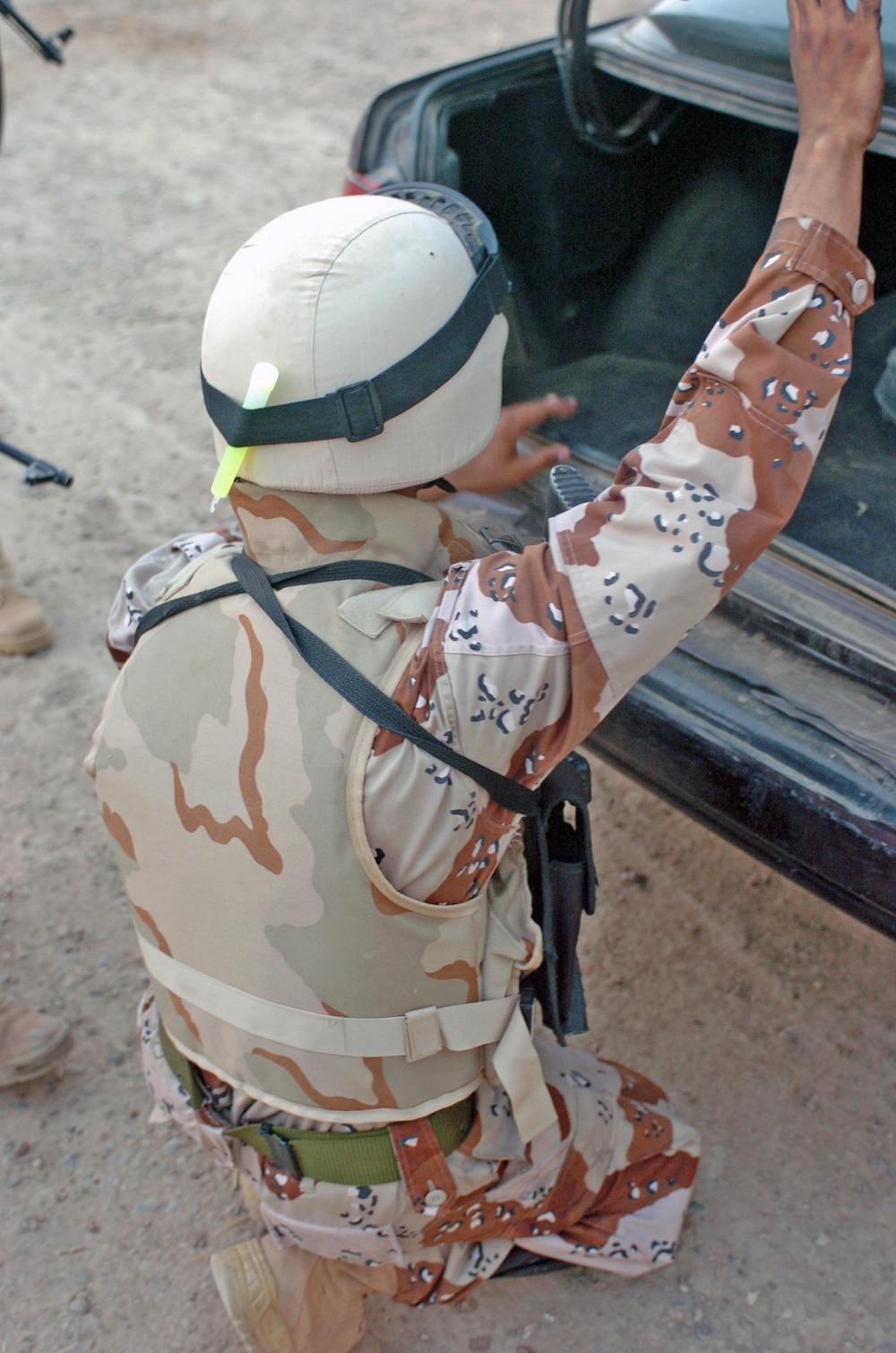 Iraqi Army searches a car during a cordon and search