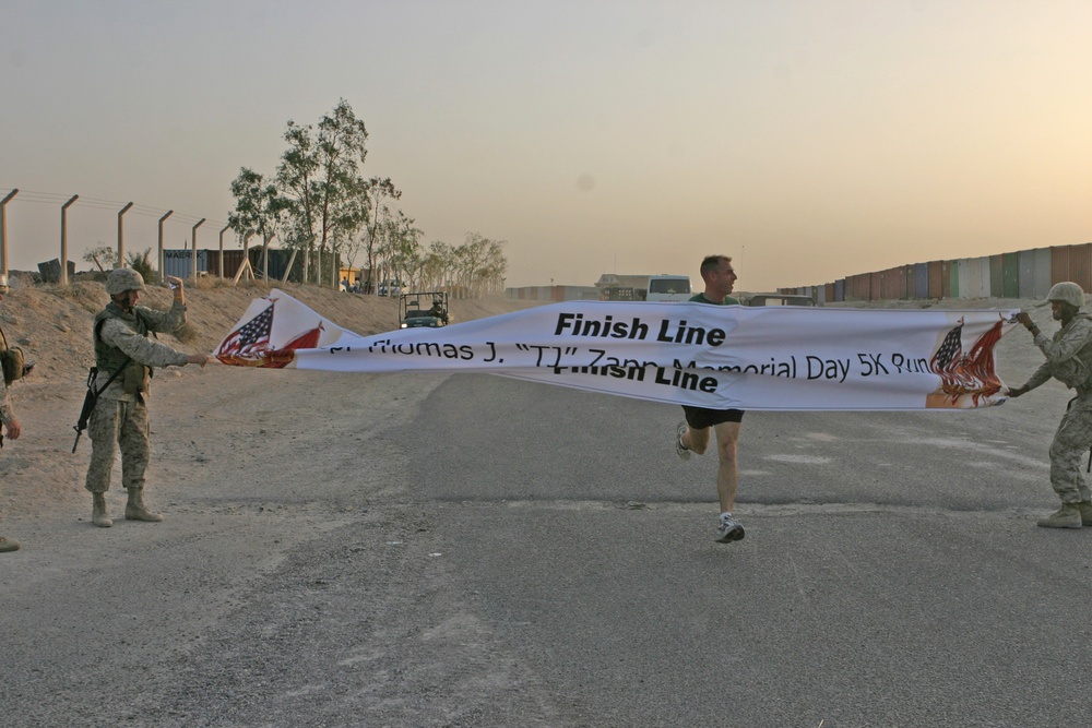 Major Murchison finishes the 5 kilometer Memorial Day run first